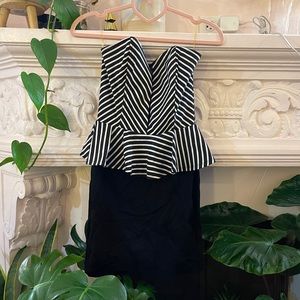 Black and white striped, strapless peplum cocktail dress